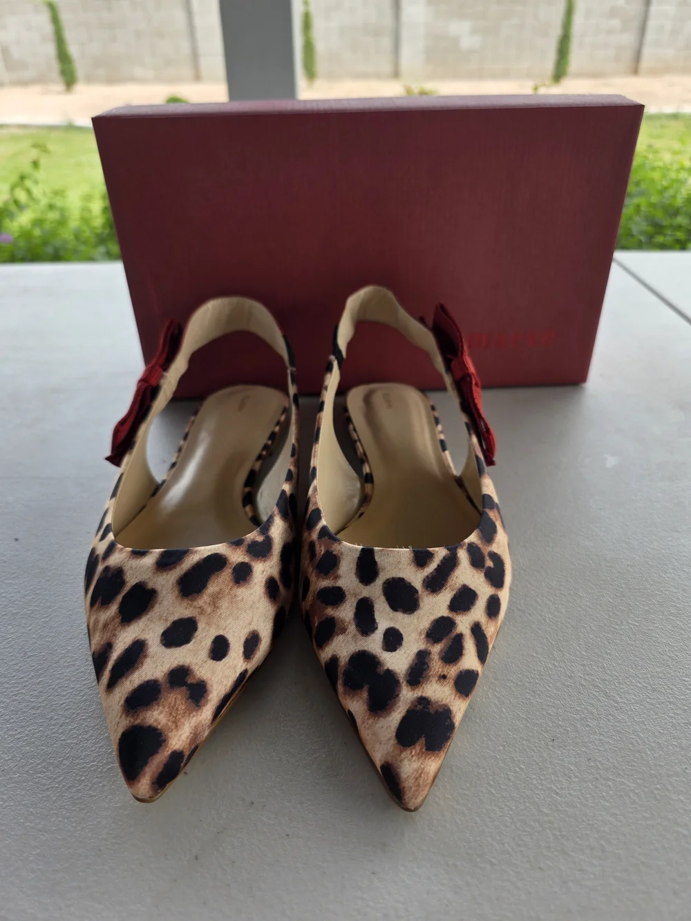 Maeve Leopard Print Pointed Slingbacks with Red Bow Accent - Picture 2 of 6
